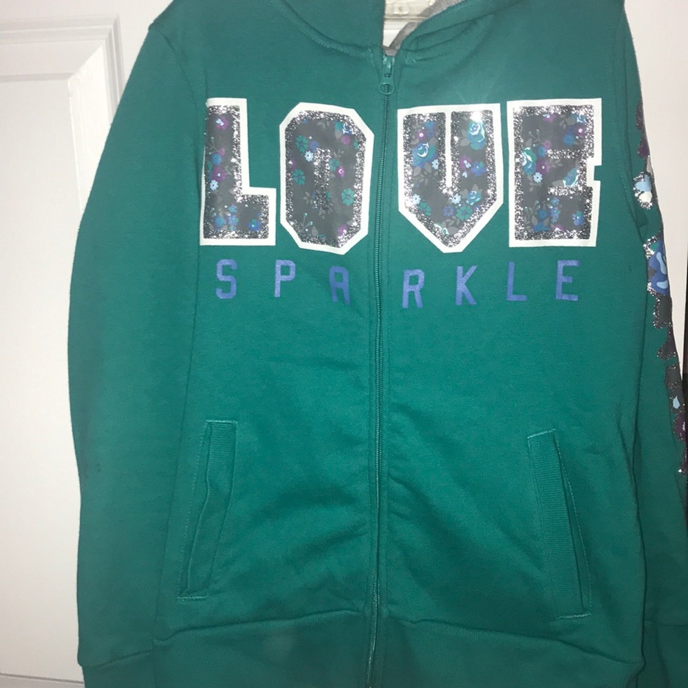 A blue jacket with a designs and a hood!!